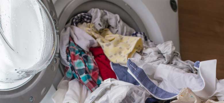 انباشته شدن لباس علت لک شدن لباس در لباسشویی