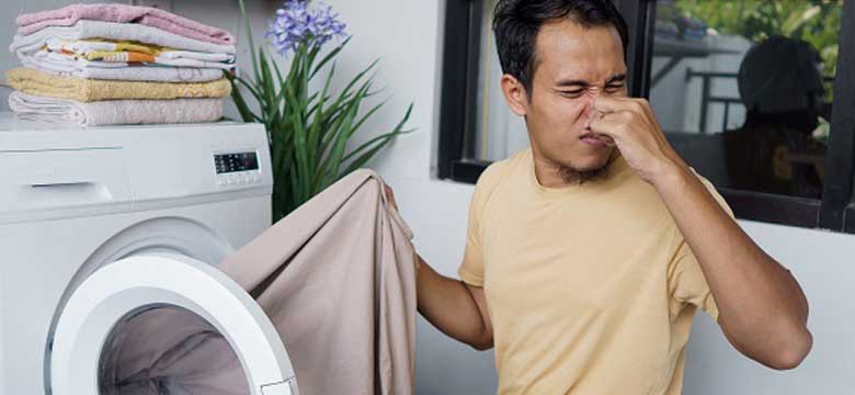 رفع بوی بد ماشین لباسشویی با تمیز کردن دیگ